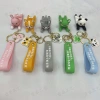 Cartoon character keychains, creative phone stands, car key pendants, cute couple bags and accessories Specification image